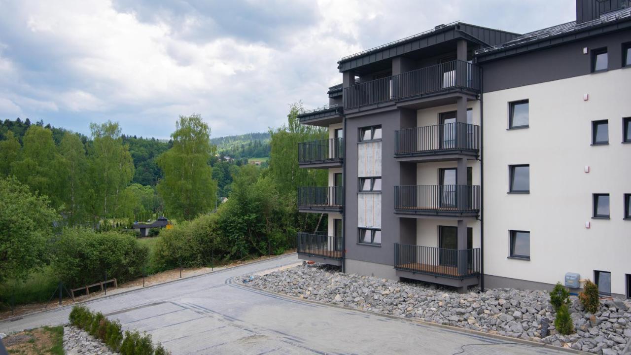 Apartamenty Sun & Snow Spokojna Висла Экстерьер фото