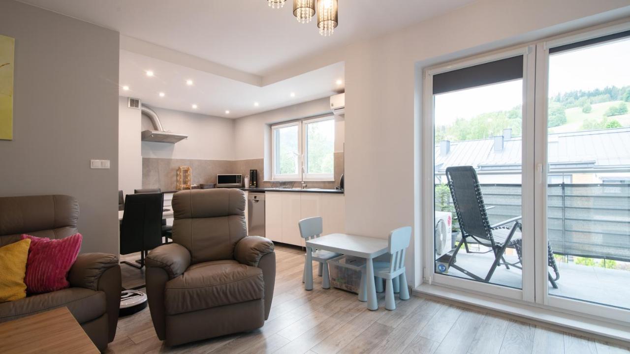 Apartamenty Sun & Snow Spokojna Висла Экстерьер фото