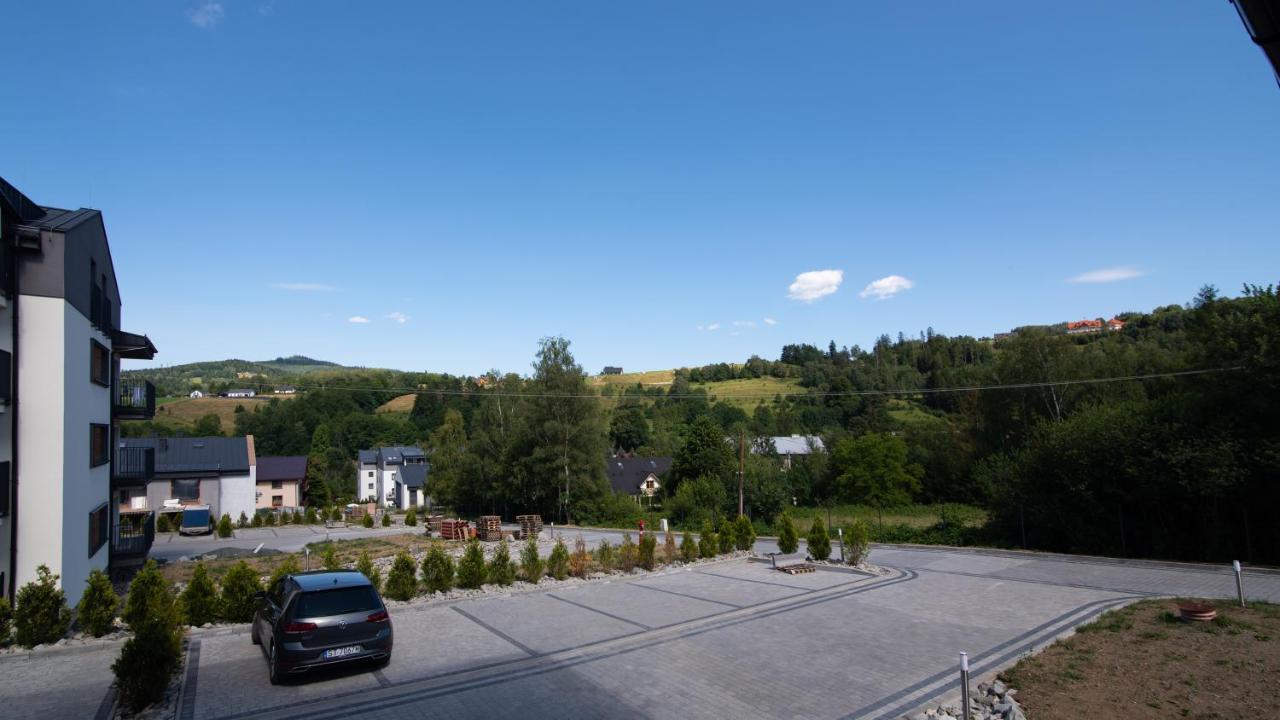 Apartamenty Sun & Snow Spokojna Висла Экстерьер фото