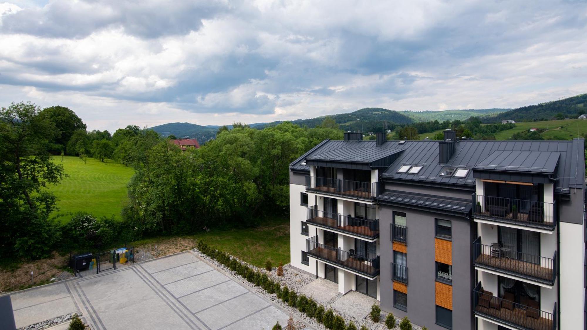 Apartamenty Sun & Snow Spokojna Висла Экстерьер фото